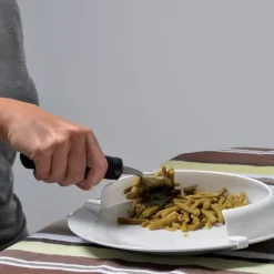 Rebord incurvé pour assiette